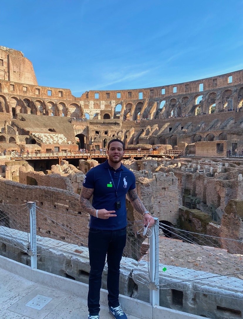 Devin Paladino inside the Colosseum in Rome